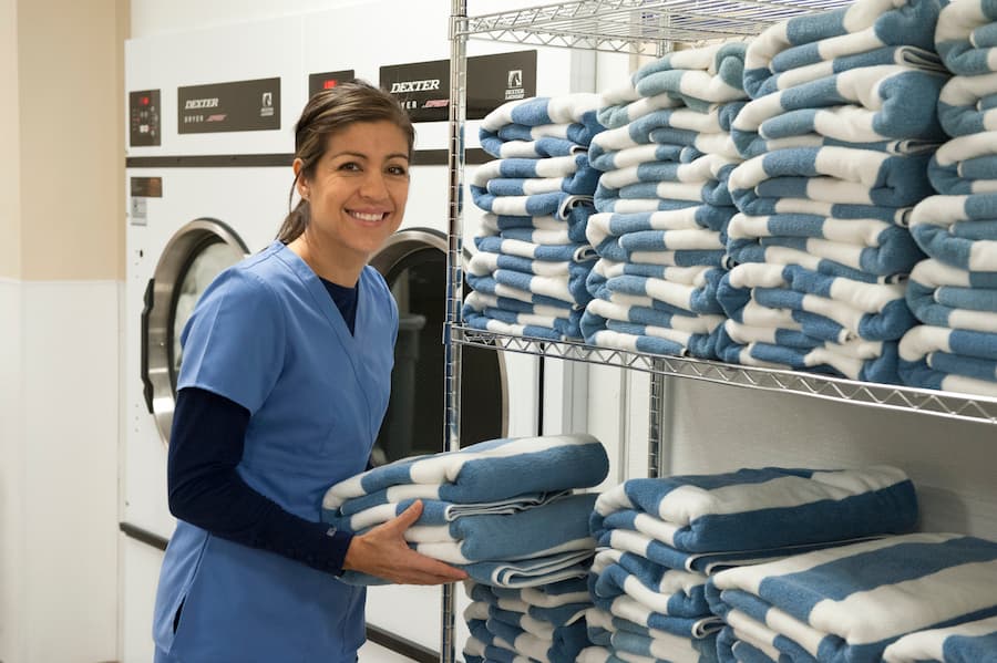 On-premise laundry equipment for hospitality businesses